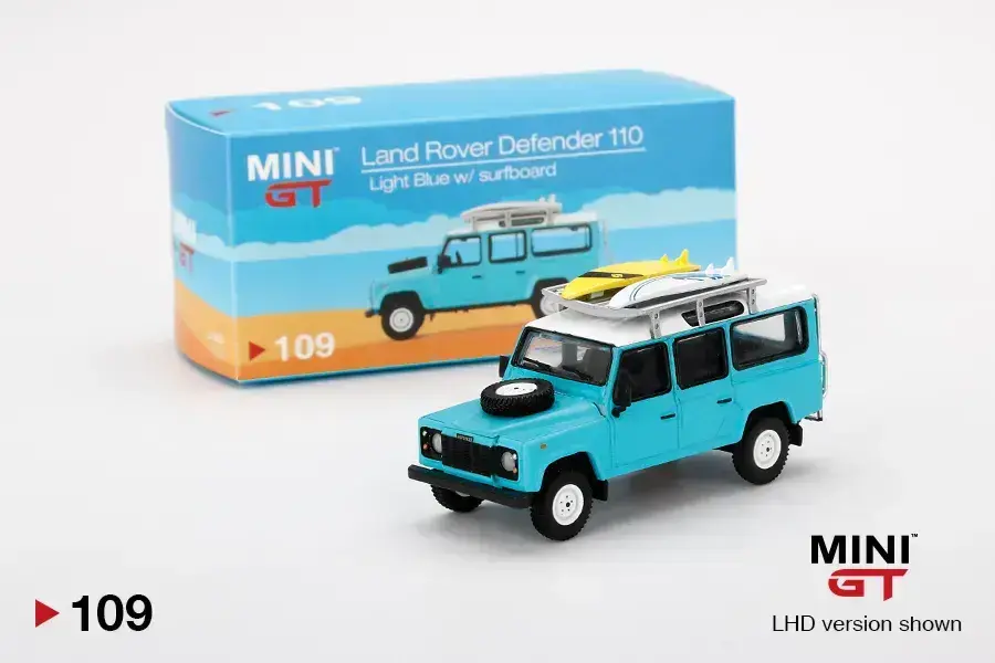 Land Rover Land Rover Defender 110 Light Blue w/ Surfboard